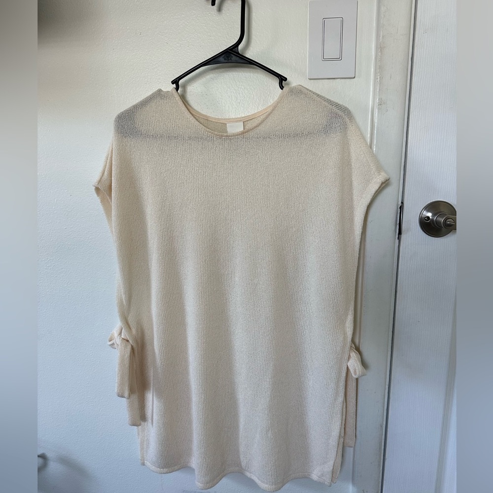 White cover up with ties on the sides